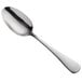 A Libbey stainless steel tablespoon with a silver handle on a white background.