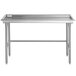 A Regency stainless steel rectangular table with legs.
