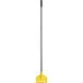 A yellow and black Rubbermaid mop handle with a metal side gate.