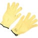 A pair of yellow gloves with black trim.