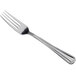A Libbey stainless steel utility/dessert fork with a silver handle on a white background.