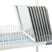A Metro Metromax iQ drying rack with trays on it.