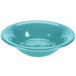 A turquoise bowl with a blue circle in the middle on a white background.