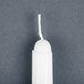 A white Will & Baumer taper candle with a white string.