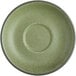 A close-up of an Acopa Embers Moss Green Matte stoneware saucer with a round center.