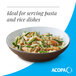 A large brown matte stoneware pasta bowl filled with pasta and vegetables.