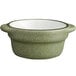 An Acopa Embers moss green stoneware sauce cup with a handle.