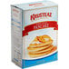 A box of Krusteaz Sweet Cream Pancake Mix with a stack of pancakes on a plate.