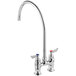 A Waterloo chrome deck-mount faucet with red and blue knobs.