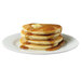 A stack of Krusteaz Professional Buttermilk Pancakes with butter and syrup on top.