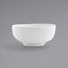 A Front of the House Harmony bright white porcelain bowl with a small rim on a white surface.