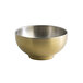 A close-up of a Front of the House Harmony Matte Brass stainless steel bowl.