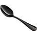 An Acopa Vernon stainless steel demitasse spoon with a black handle.
