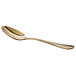 An Acopa Vernon stainless steel spoon with a gold handle.