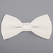 A white Henry Segal clip-on bow tie.