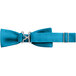 A close-up of a turquoise poly-satin bow tie with a metal buckle.