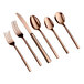 Six pieces of rose gold-colored flatware, including two forks, a knife, and three spoons, are arranged side by side on a white background.