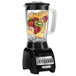 A Hamilton Beach blender filled with fruit