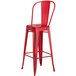Lancaster Table & Seating Alloy Series Distressed Red Metal Indoor / Outdoor Industrial Cafe Barstool with Vertical Slat Back and Drain Hole Seat Main Thumbnail 4