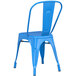 A blue metal Lancaster Table & Seating outdoor cafe chair with a backrest.