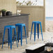 Lancaster Table & Seating Alloy Series Blue Stackable Metal Indoor / Outdoor Industrial Barstool with Drain Hole Seat Main Thumbnail 1