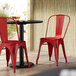 Lancaster Table & Seating Alloy Series Distressed Red Metal Indoor / Outdoor Industrial Cafe Chair with Vertical Slat Back and Drain Hole Seat Main Thumbnail 1