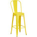 Lancaster Table & Seating Alloy Series Yellow Metal Indoor / Outdoor Industrial Cafe Barstool with Vertical Slat Back and Drain Hole Seat Main Thumbnail 3