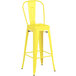 A yellow metal Lancaster Table & Seating barstool with a backrest.