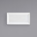 A white rectangular Front of the House Kyoto porcelain plate on a gray background.