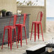 Lancaster Table & Seating Alloy Series Red Metal Indoor / Outdoor Industrial Cafe Barstool with Vertical Slat Back and Drain Hole Seat Main Thumbnail 1