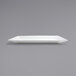 A white rectangular Front of the House Kyoto porcelain platter on a grey surface.