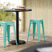 Lancaster Table & Seating Alloy Series Seafoam Stackable Metal Indoor / Outdoor Industrial Cafe Counter Height Stool with Drain Hole Seat Main Thumbnail 1