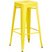 Lancaster Table & Seating Alloy Series Yellow Stackable Metal Indoor / Outdoor Industrial Barstool with Drain Hole Seat Main Thumbnail 3
