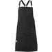 A black Mercer Culinary bib apron with black leather straps and pockets.