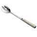 A Vollrath stainless steel serving spoon with a hollow handle.