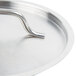 A Vollrath stainless steel pan cover with a metal handle.