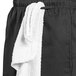 Uncommon Chef 4100 Unisex Black Cargo Chef Pants with a white towel on them.