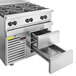 A stainless steel Wolf commercial gas range with a refrigerated drawer.