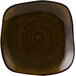 A dark brown square china plate with a circular pattern.