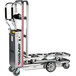 A silver Magliner hand truck with metal handles.
