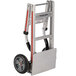 A silver Magliner hand truck with wheels.
