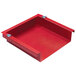 A red metal tray with two screws.