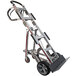 A silver and black Magliner appliance hand truck with wheels and a handle.
