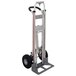 A white Magliner hand truck with pneumatic wheels and a handle.