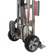 A silver and black Magliner hand truck with wheels and a handle.