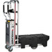 A black and silver Magliner hand truck with a handle.