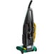A green and black Bissell Commercial ProBag upright vacuum cleaner on wheels.