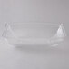 A clear plastic rectangular bowl with a ribbed design.