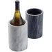 An American Metalcraft black marble wine cooler holding a bottle of wine.
