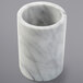 An American Metalcraft white marble cylinder with a grey surface.